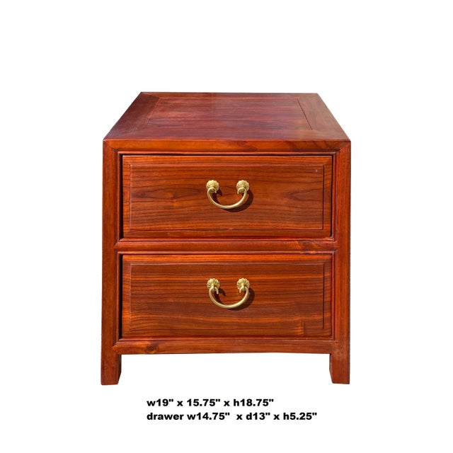 This is a handmade Chinese oriental end table nightstand with 2 drawers. The surface is finished with a medium brown stain...