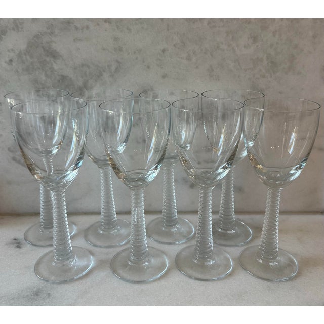 Set of 8 wine glasses with ribbed or spiral stems. Made in Turkey circa late 20th century in the manner of Lalique....