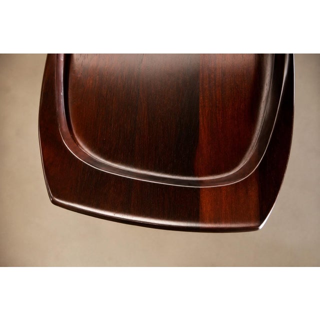 A large Model 731 serving tray designed by Jean Gillon for WoodArt in Brazil, circa 1960s. Crafted in richly figured...
