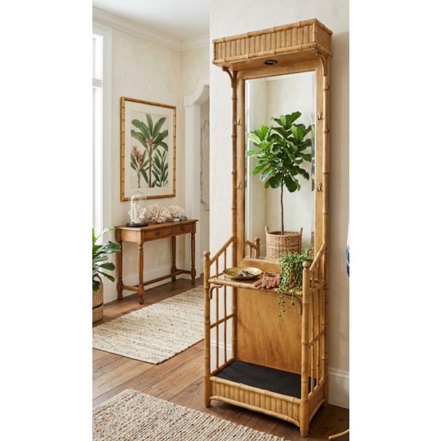 ​Elevate your entryway, foyer, or dressing area with this striking Palm Beach Regency-style mirrored hall tree/ coat rack...