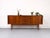 Beautiful sideboard in the style of Arne Vodder. with its two practical sliding doors and four drawers, this sideboard...