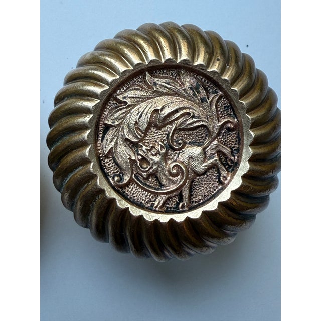 19th century cast bronze door knobs in the Empire patter from Corbin Hardware. Designed and fabricated by the P.F. Corbin...