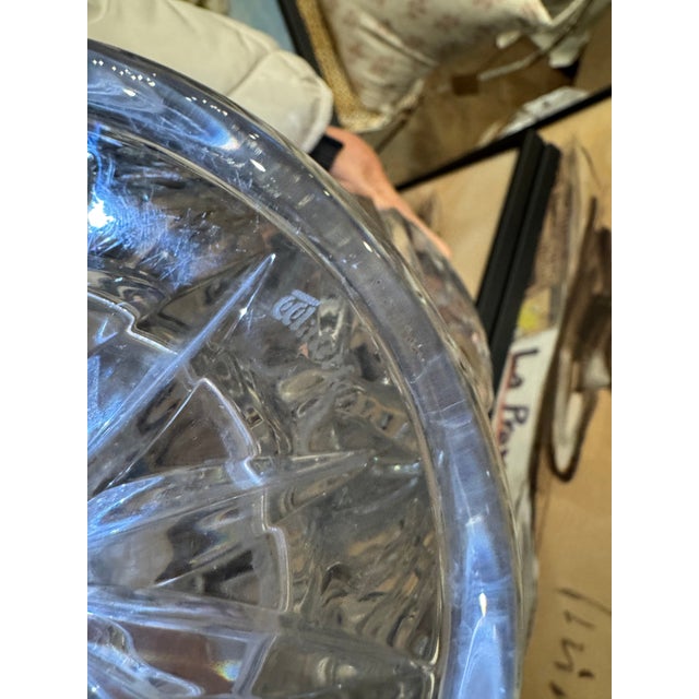 Elegant Waterford cut crystal footed vase featuring a dramatic scalloped (ruffled) rim, vertical fluted body, and...