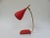 Table lamp from the 50s, in the combination shrink varnish red and brass from the company Gebr. Cosack, Neheim-Hüsten....