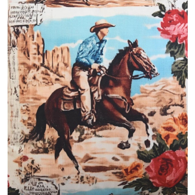 Beautiful vintage-style western cowboy pillow featuring a detailed rodeo graphic print of a cowboy riding a galloping...