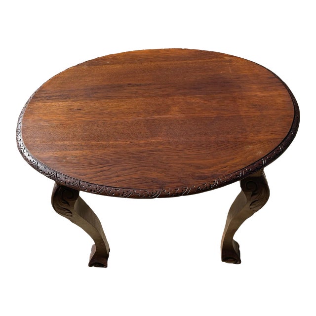 Oval Carved Top Side Table With Claw and Ball Cabriole Carved Legs For Sale