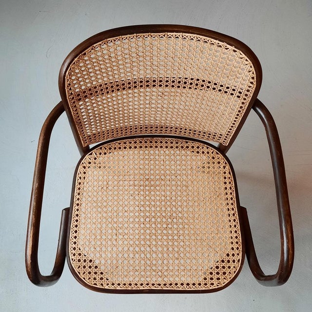 This Prague or 811 chair was designed by the Austrian Josef Hoffmann, who designed the chair for Thonet in the 1920s....