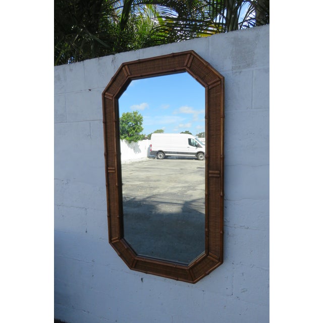 This gorgeous Mirror is made of wood, caning, and mirror. It was made by American of Martinsville, it is not stamped, but...