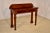 19th century mahogany console table from England with modern and clean lines. The backsplash is nicely shaped on the ends...