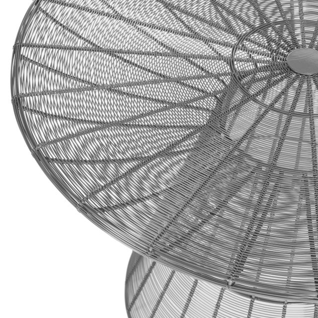 Solid and sexy, the transitional wire coffee table is a sculptural accent in the living room or family room.A perfect...