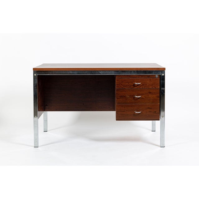 This vintage mid-century modern rosewood writing desk was designed by Jean Gillon for Italma Wood Art and made in Brazil...