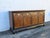 This magnificent Sideboard is made of wood, solid wood, veneer, and metal. The Sideboard was made by a fine furniture...