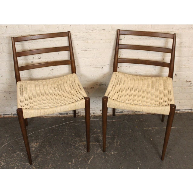 Set of six Danish style dining chairs with woven seats and ladder backs. Designed in the style of Niels Otto Moller.