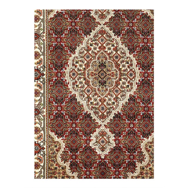This Tabriz Persian Design Hand-Knotted Wool Red Area Rug is handmade, hand-knotted. Lamb's wool on a cotton backing with...