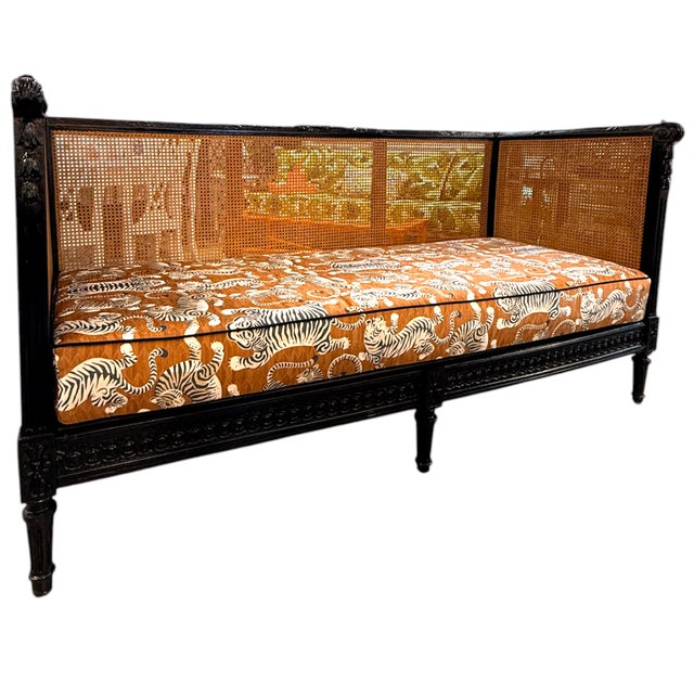 A stunning statement piece, this vintage daybed has been professionally restored and reimagined. The solid wood frame has...