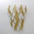 Pair of wall lamps, each composed of 35 gold and white Murano blown glass rhombuses. The lamps have six E14 lamp holders...