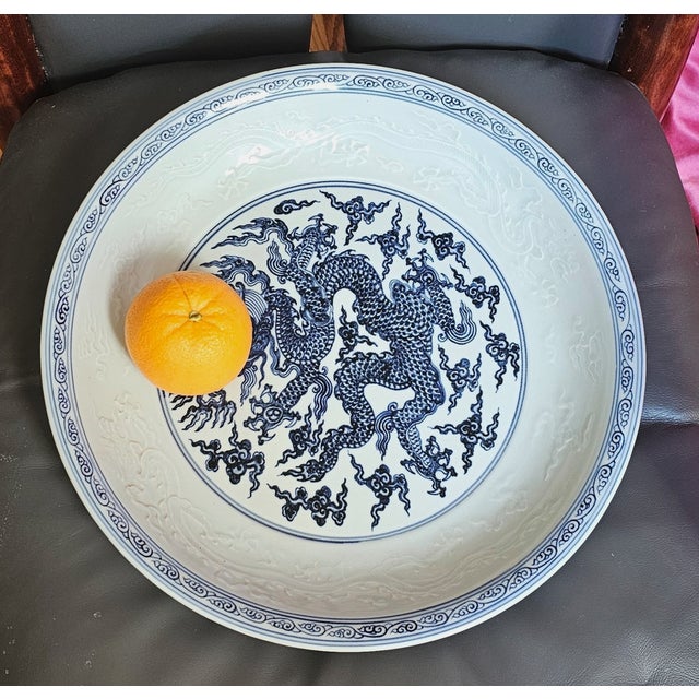 Very Large Amazing Glazed Chinese Charger Plate with Blue Dragons Dragon relief on the side. Glaze has light blueish hue...