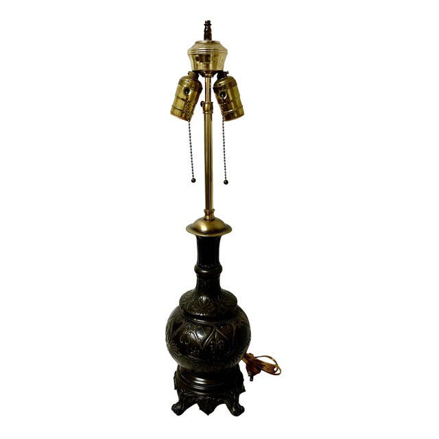 A wonderful vintage French bronze empire lamp with a dark patina. The lamp has a wonderful empire design all over.. New...