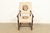 A beautiful antique English Jacobean or Tudor style armchair, club chair, or library chair In the manner of Berkey & Gay...