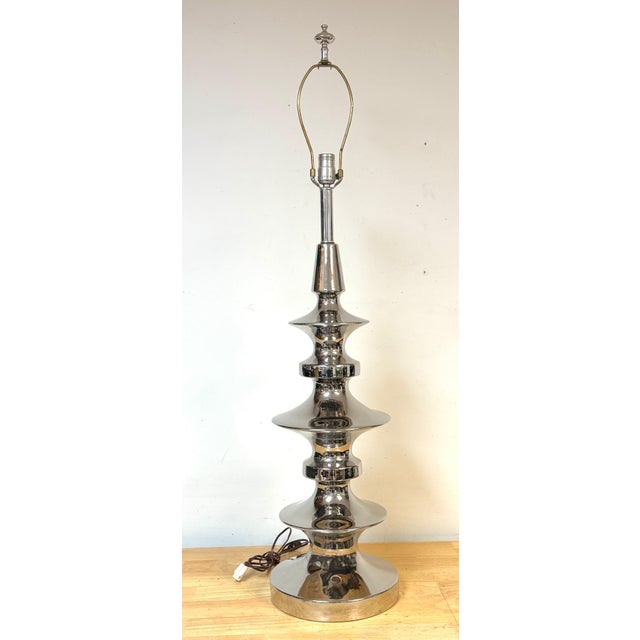 Tony Duquette Style Mercury-Glazed Porcelain Totem Lamp, Hollywood Regency A striking sculptural table lamp inspired by...