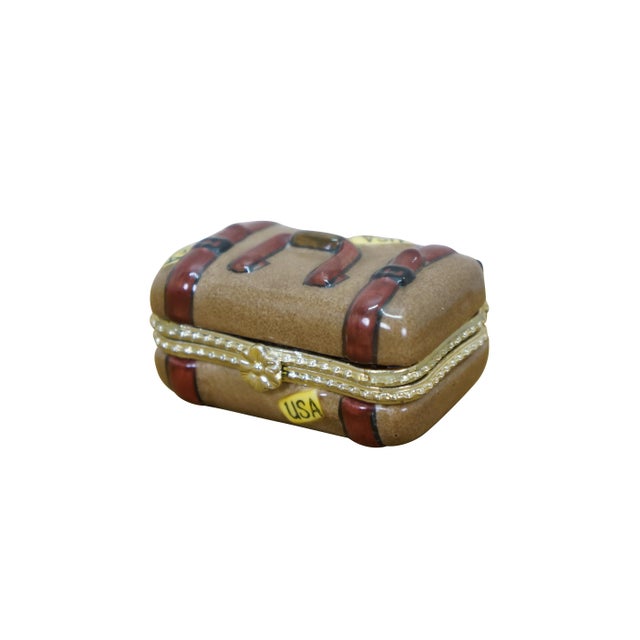 Late 20th century Limoges porcelain trinket / keepsake box in the shape of a brown suitcase, hand painted with darker...