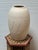 Design Plus Gallery presents an Off White Signed Pottery Vase. This vase is in a fresh white finish with black brush...