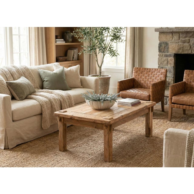 A celebration of honest material and utilitarian design, this coffee table is crafted from solid reclaimed teak. Its...
