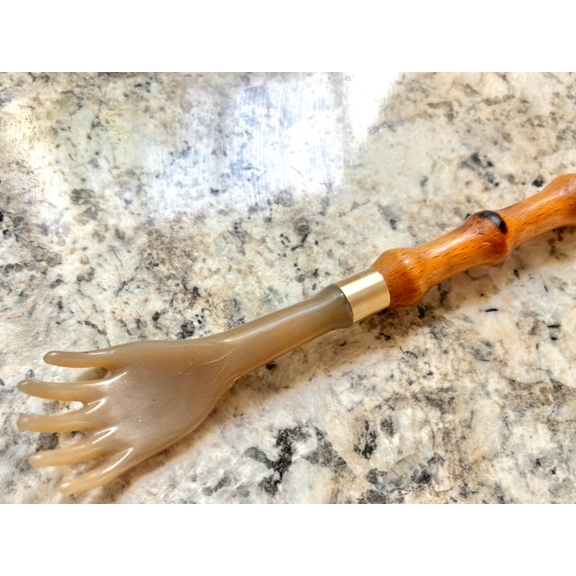 Italian bakelite back scratcher and shoe horn with a bamboo-style wooden handle. Marked "Made in Italy". Please see...