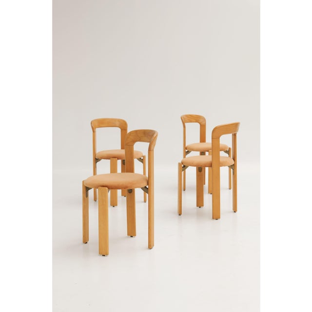 Chair 3300 designed by Bruno Rey and produced by Dietiker. Wooden frame with an upholstered seat covered in brown fabric....