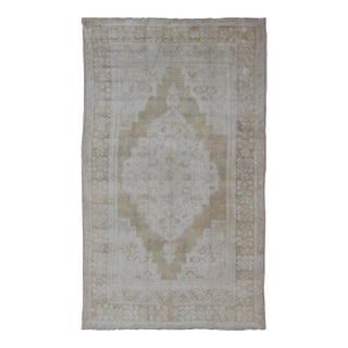 Medallion Design Vintage Oushak Rug in Muted Tones of Faded Yellow and Neutrals For Sale