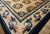 Ivory A Small Ivory Ground Color With Black-Orange Dragon in a Chinoiserie Pattern Antique Chinese Baotou Rug For Sale - Image 8 of 12