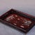This is a beautifully detailed vintage rectangular tray, crafted from Zitan wood (purple sandalwood) and decorated with...