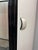 Mid-Century Modern Mid-Century Italian Glass Display Cabinet with White Leather Doors in Black Wooden Frame by Rossi Di Albizatte, Italy, 1970s For Sale - Image 3 of 7
