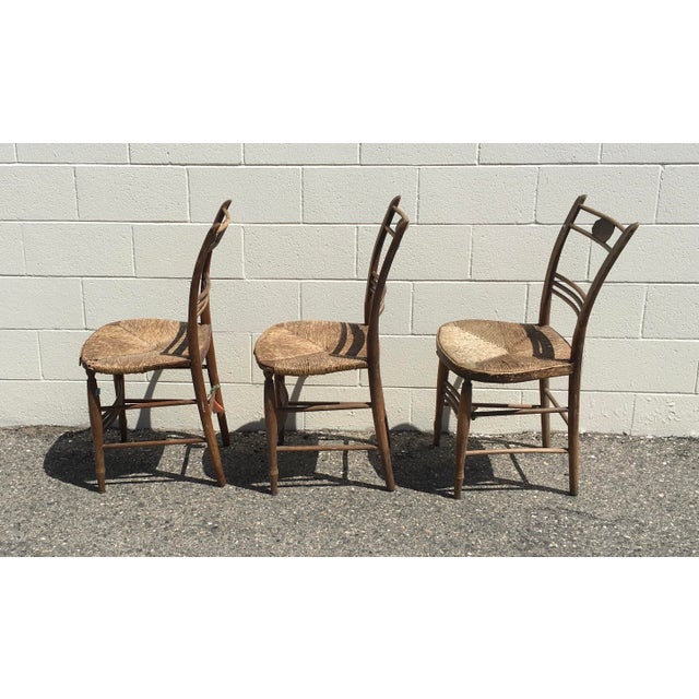 Beautiful set of 3 Vintage Americana wood side chairs, spindle back, round rattan seats. 35” tall, 18” wide, 16” deep, 18”...