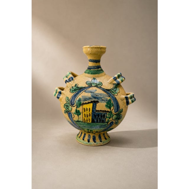 A splendid and imposing multi-handled pilgrim flask (also known as a borragina or viandante vase), entirely hand-thrown...