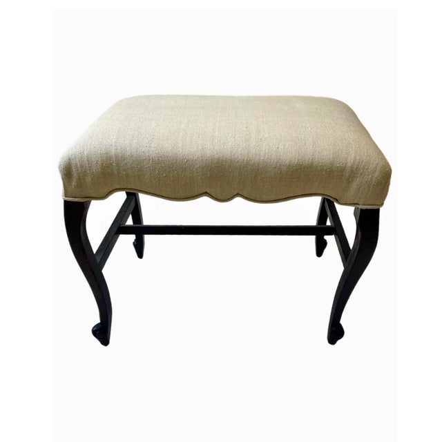 Elegant Regency bench with scrolling mahogany legs terminating in a ram's head base. Wonderful curved detail with welting....