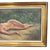 An elegant antique oil painting depicting a reclining female nude, dating from the early 20th century. Executed in oil on...