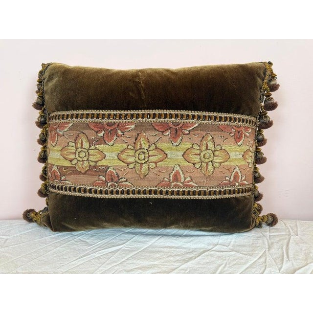 This sophisticated pillow harmoniously blends antique charm with modern luxury. The centerpiece features an authentic 19th...