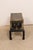 A Chinese leather-wrapped wooden trunk with brass and nail-head accents from the 19th century and raised on a vintage wood...