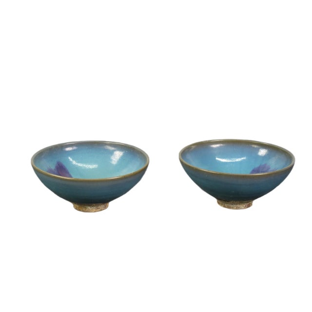 A pair of blue and purple ceramics bowls, each one handcrafted to perfection by master artisans from China. With their...