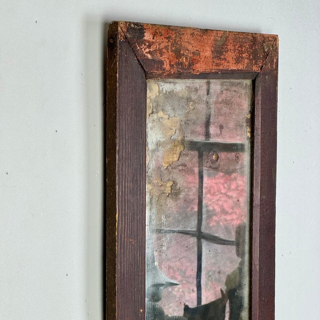 That peeking red/pink/peach color is one of the prettiest hues we've seen this year. We believe it to be the original...