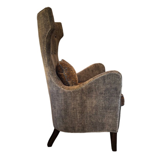 all glamorous wing back chair upholstered exclusively for THE TASTEMAKER SHOPPE. Very comfortable with a sexy curvaceous...