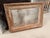 Large rustic wall mirror featuring a beautifully distressed wood frame with layered natural patina. The frame showcases...