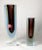 The pair consists of two massive and linear Murano glass vases of three colors; they have a strong line, with sharp,...