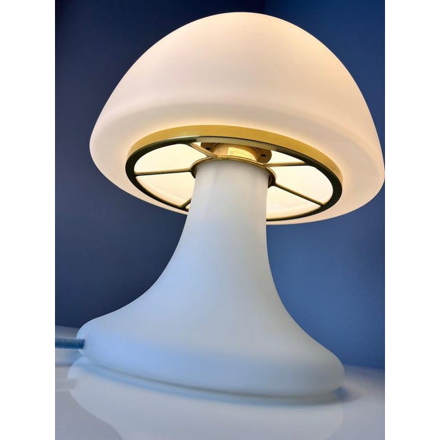 This table lamp from Glashütte Limburg is an iconic design object from the Space Age era. Its characteristic mushroom...