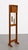 Mid Century Modern Floor Clock featuring a solid teak case with minimalist brass accents and a sculptural open frame...