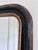 Antique French Louis Philippe small full-length mirror, dating to the late 19th century. The mercury glass mirror features...