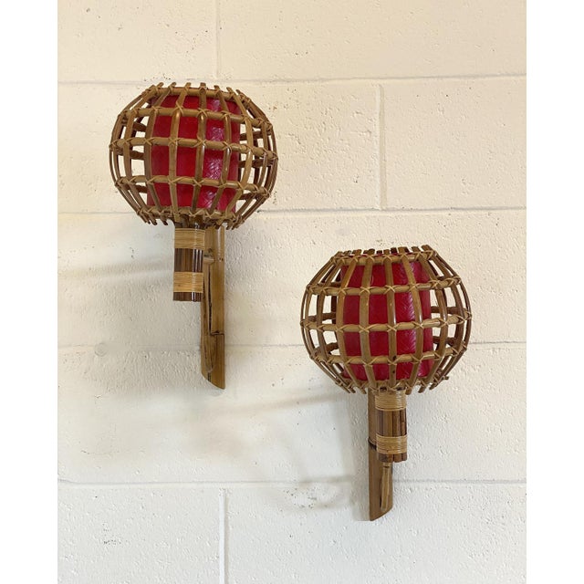 Pair of 1970s rattan and bamboo wall sconces. European Plug (up to 250V).The wiring of this item may be original and might...