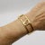 This 18k gold Tiffany & Co. bracelet is a classic Tiffany design from the Atlas collection. Inspired by the Atlas clock...