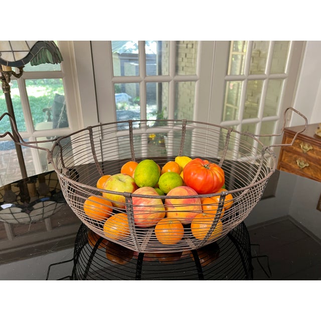 Rustic hand crafted metal gathering basket. Great for displaying all your fresh fruit and vegetables. Spoke design also...